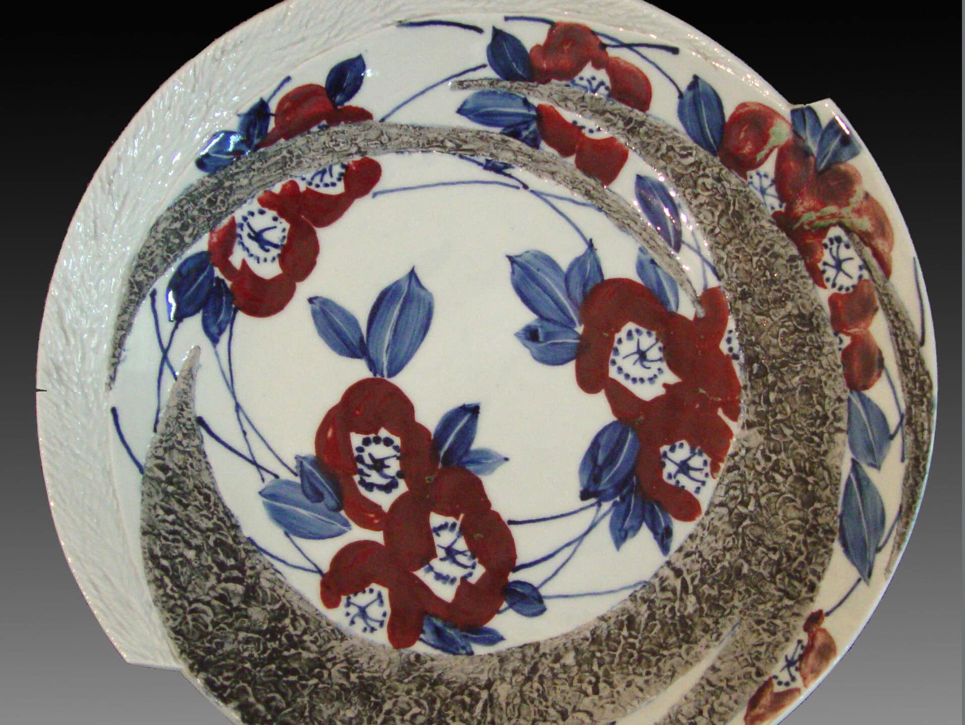 Jingdezhen Ceramic Plate with Floral Motifs in Underglaze Blue and Underglaze Red with Textured Relief Decoration