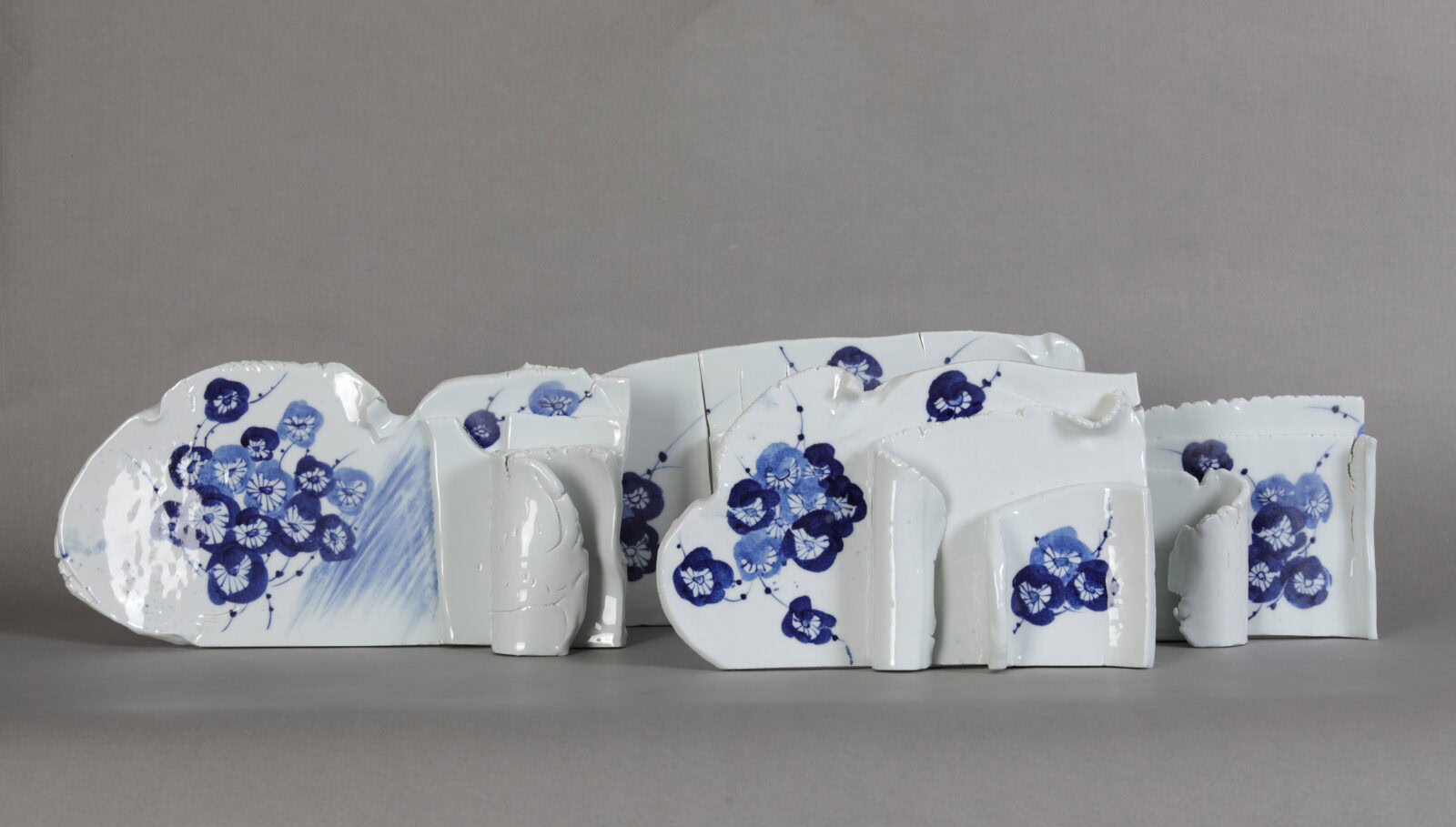 Combined Ceramic Sculpture of Poppy Motifs in Underglaze Blue